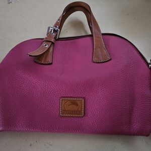Beautiful Pink Dooney and Burke shoulder bag.